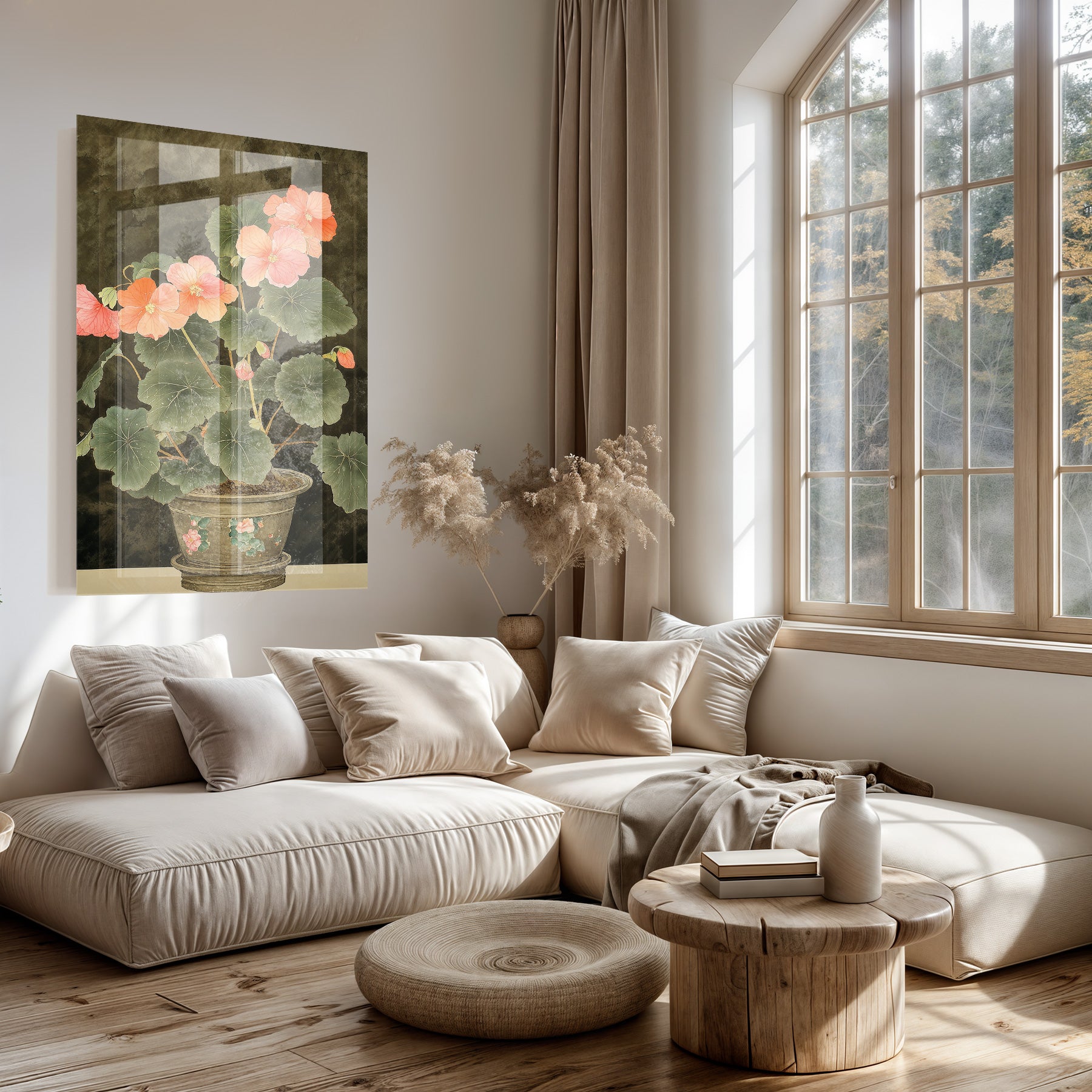 Plexiglas schilderij Begonia boven een lichte bank in een woonkamer.