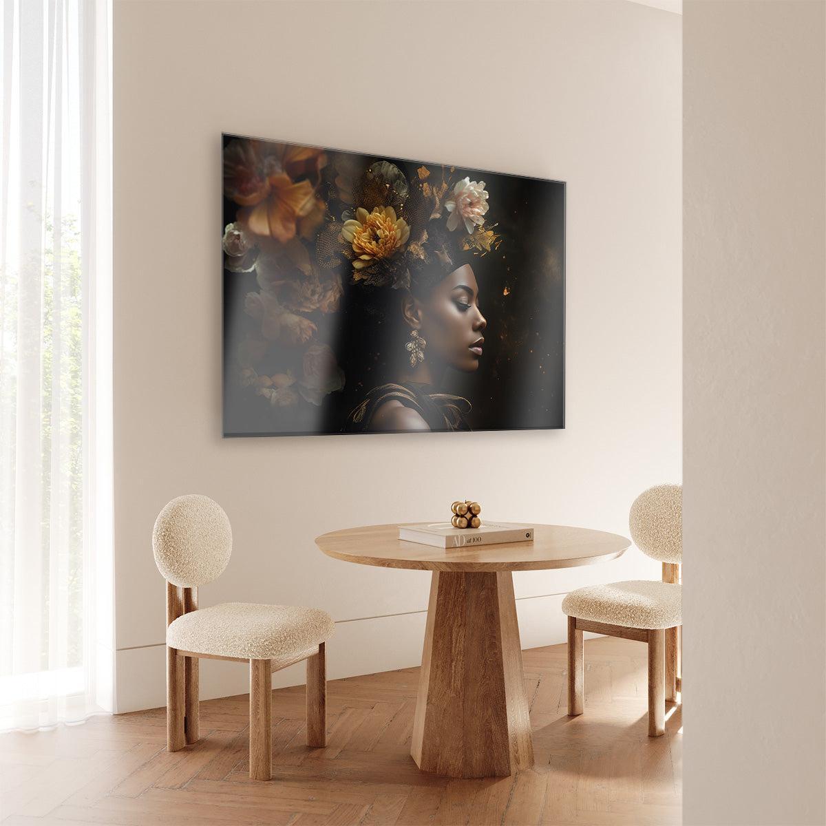 Plexiglas schilderij Bloemen Vrouw 3 aan de muur bij een ronde houten eettafel.